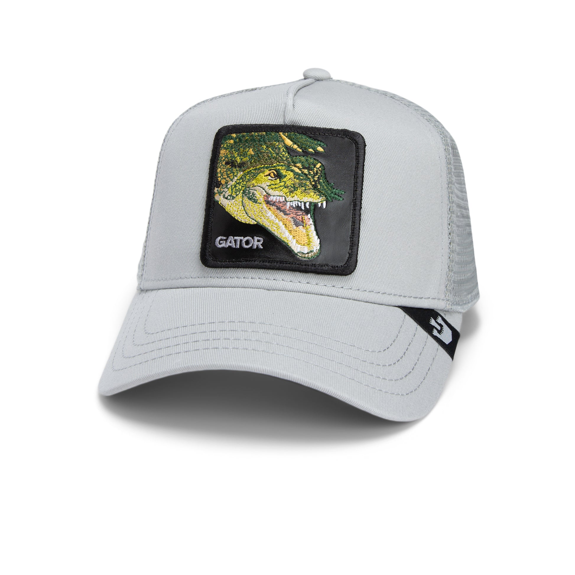 Hellgraue Trucker-Cap mit schwarzem Patch und grünem alligatorartigen Krokodilkopf-Motiv.